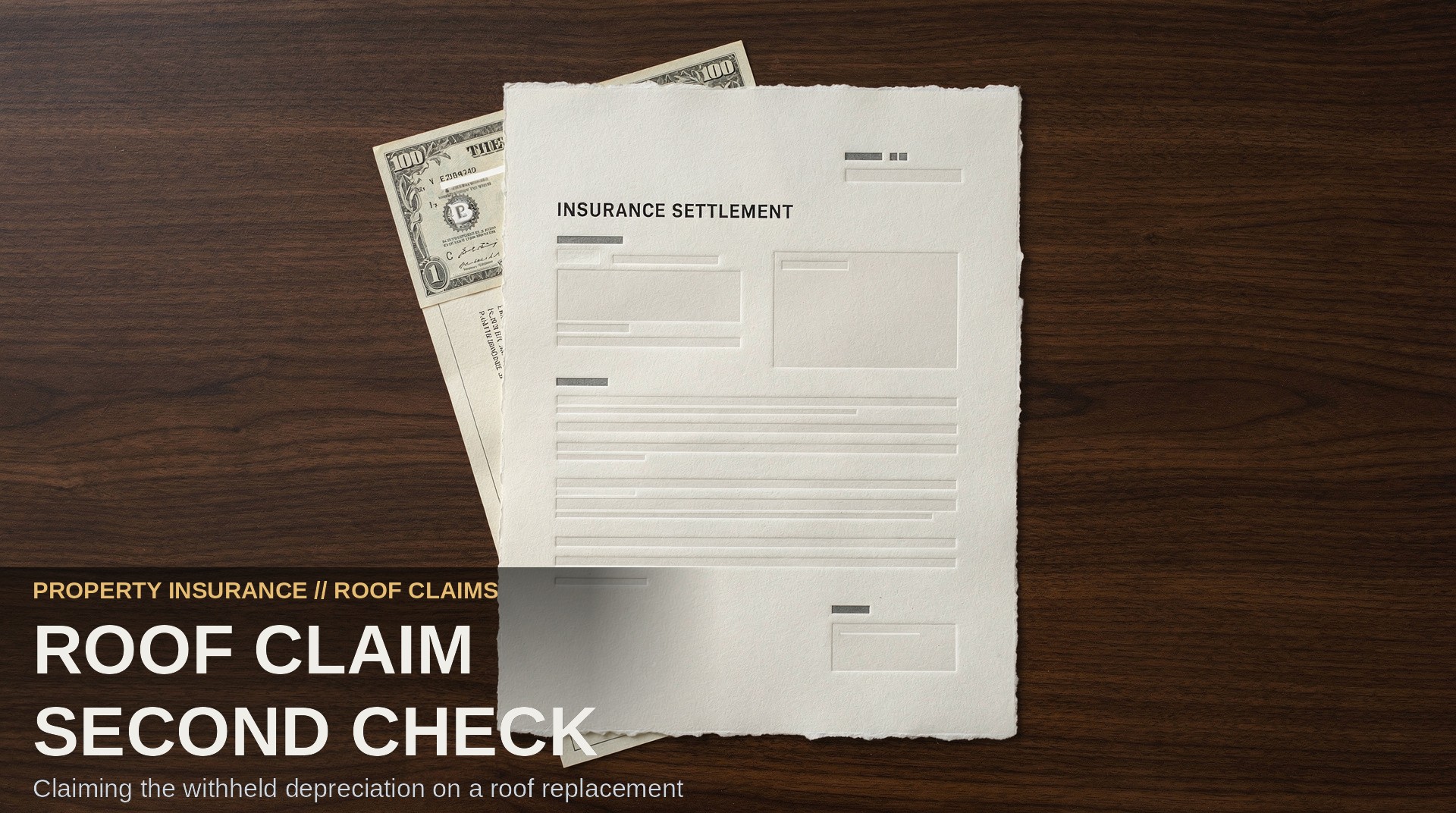 Roof Claim Second Check. An insurance settlement document and a bank check resting on a dark walnut desk.